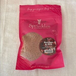 Pink Zebra Bourbon & Oud Wax Melts in Pink Packaging